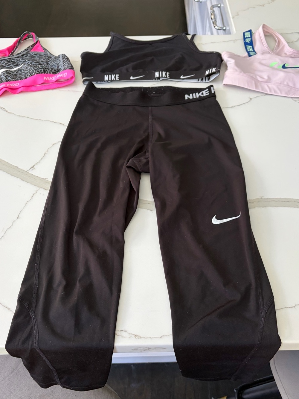 Nike Black Cropped Kids Athletic Leggings with matching sports bra
